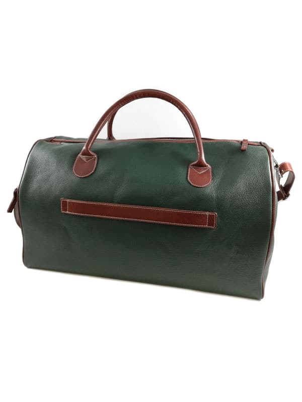 Green leather duffel bag with brown leather handles and accents