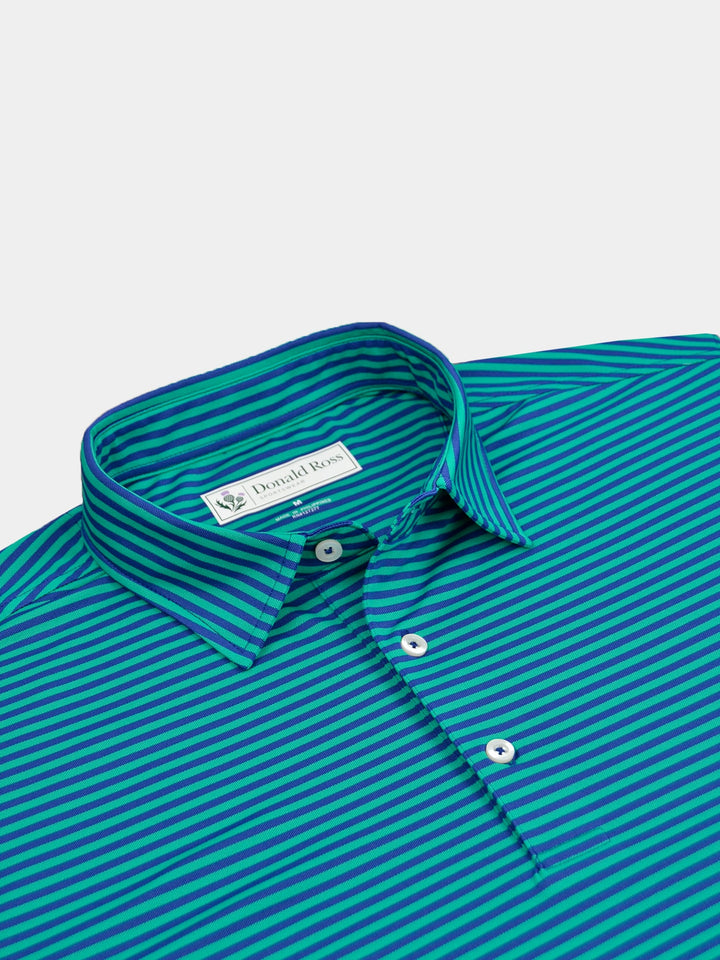 Blue and green striped polo shirt with a button-down collar, neatly folded. Includes stretchy and breathable pique fabric