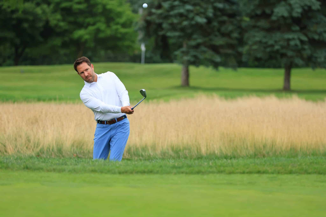 A mean wearing Donald Ross Sportswear, golfing