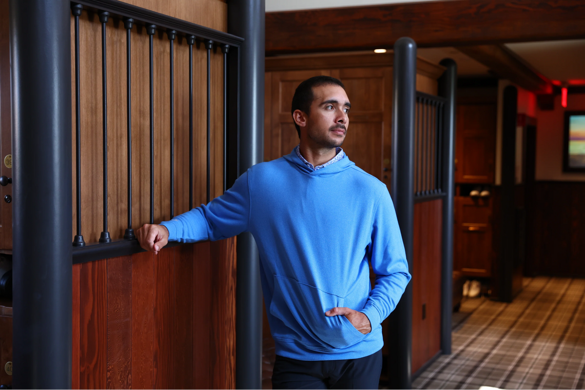 A man wearing a Donald Ross Sportswear golf pullover