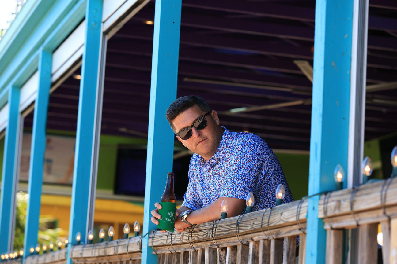 Men wearing golf wear to a cocktail function