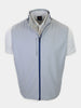 A light gray sleeveless jacket with a blue zipper is displayed against a neutral background, revealing a white collared shirt underneath.
