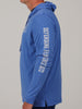 A person in a blue hooded sweatshirt with "Defending Paradise 1972" printed on the sleeve. The background is plain, highlighting the casual attire.