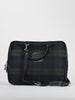 Tartan-patterned laptop bag with green and blue checks, featuring black leather straps and accents