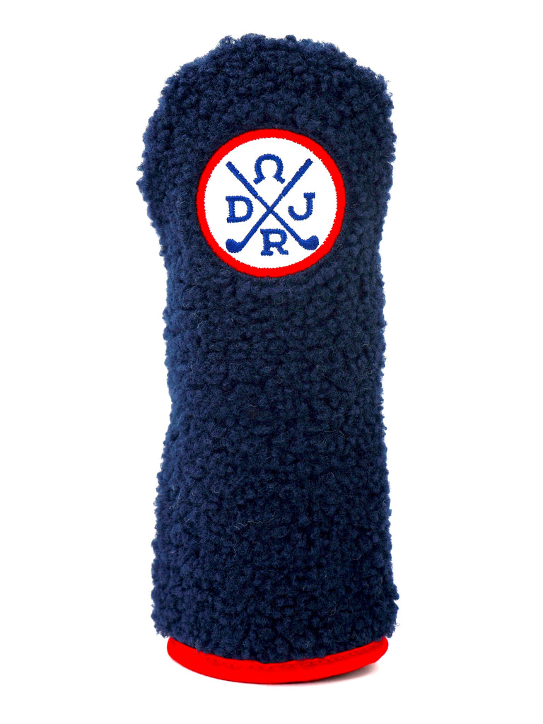 Navy blue wool putter cover with embroidered DJRR golf crest and red trim.
