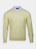 Light yellow sweater with a V-neck, layered over a white collared shirt. The sweater is displayed against a plain white background, creating a clean and elegant look.