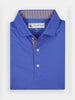 Folded blue polo shirt with a striped inner collar and three buttons, displaying a Donald Ross label