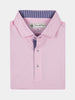 Folded pink polo shirt with a striped inner collar and buttoned placket