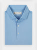 Folded light blue polo shirt created by Donald Ross Sportswear