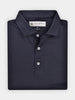 Folded black performance golf polo shirt with a classic collar and three white buttons