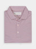 Orange and white striped performance polo shirt neatly folded, featuring a collar and buttons