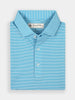 Folded blue and white striped polo shirt, featuring buttons and a collar