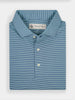 Folded blue and white striped polo shirt, made from advanced performance fabric