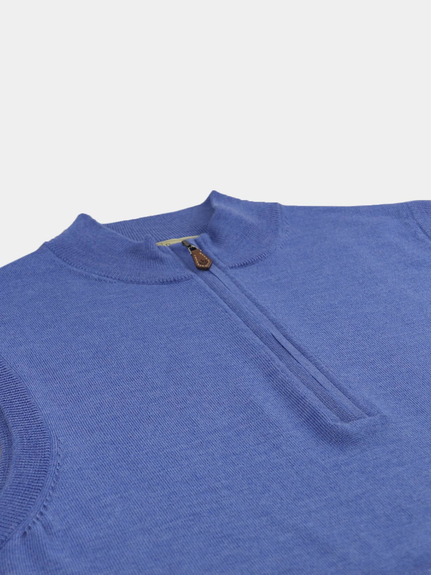 Blue knit sweater vest with a quarter zip and round collar, laid flat against a white background