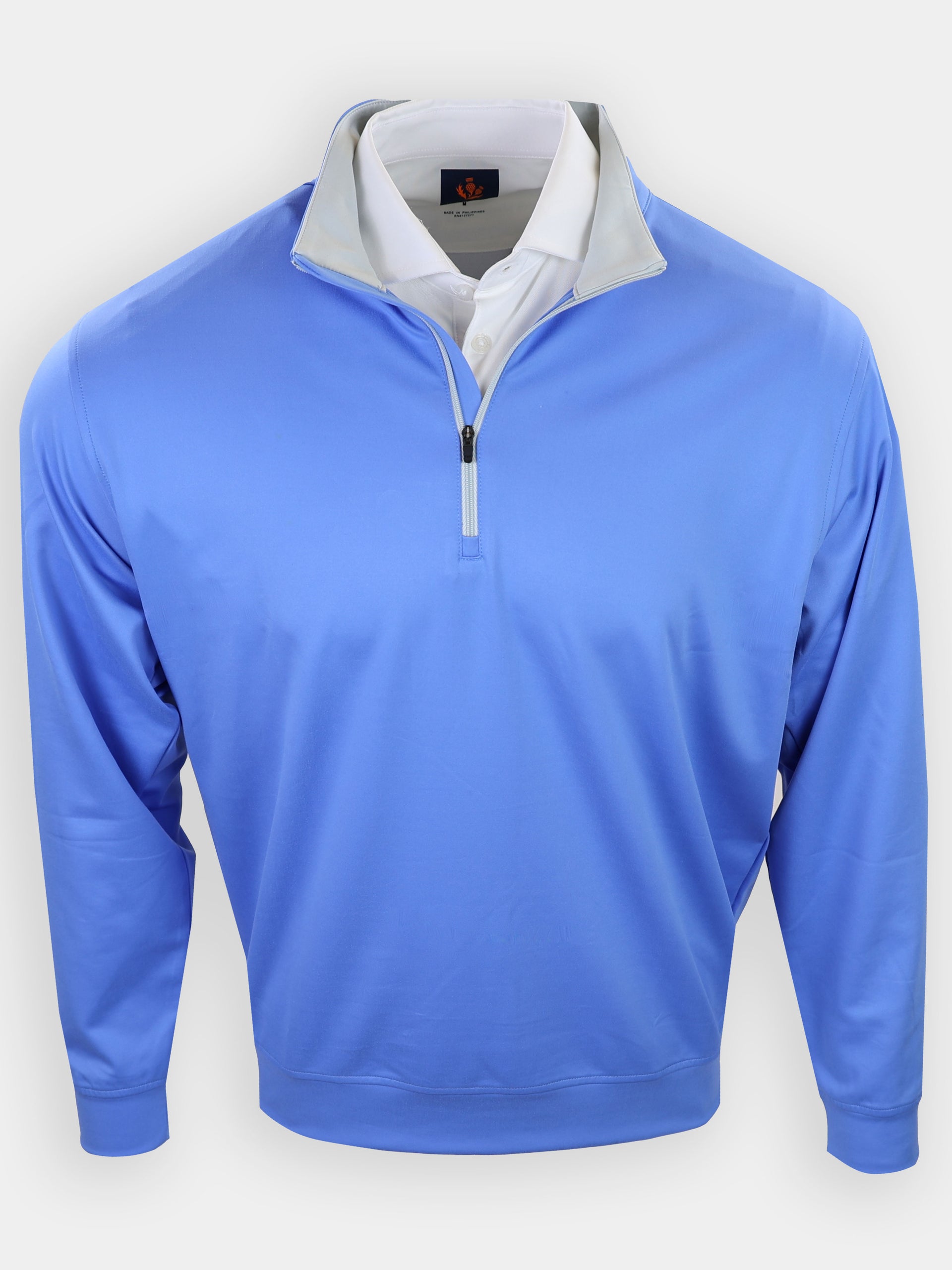 Light blue long-sleeve pullover with a zippered collar and a white shirt underneath.