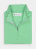 Folded mint green half-zip pullover with a white inner lining