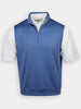 Blue sleeveless vest with a half-zip, worn over a white short-sleeved polo shirt.