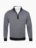 Front view of the Aberdeen Sweater in Black, featuring a subtle charcoal herringbone jacquard pattern and quarter-zip collar.
