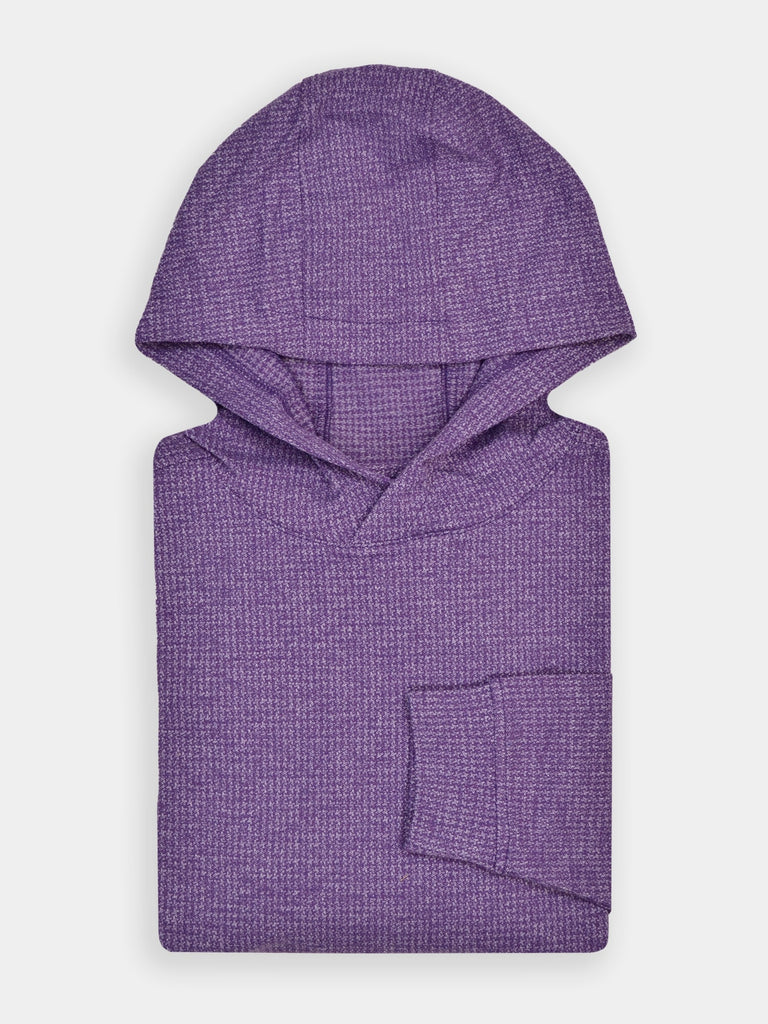 Folded purple hooded herringbone sweater with a subtle textured pattern, displayed neatly against a white background