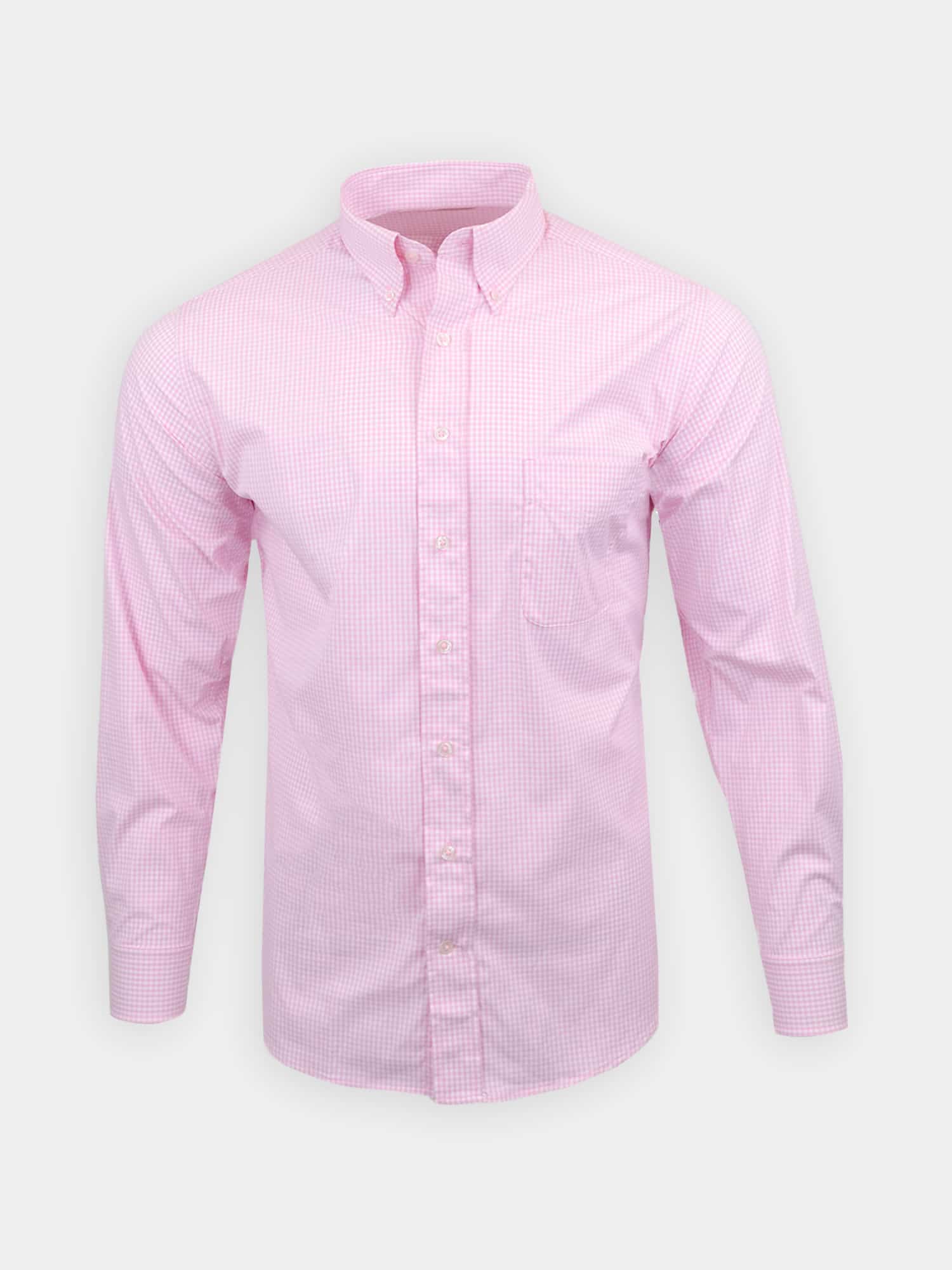 Light pink dress shirt with a subtle checkered pattern on a gray background. It features a button-down collar, long sleeves, and a front pocket.
