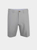 Grey tailored golf shorts with belt loops, a button closure, and a subtle crease. The style is formal yet relaxed, suitable for warm weather.