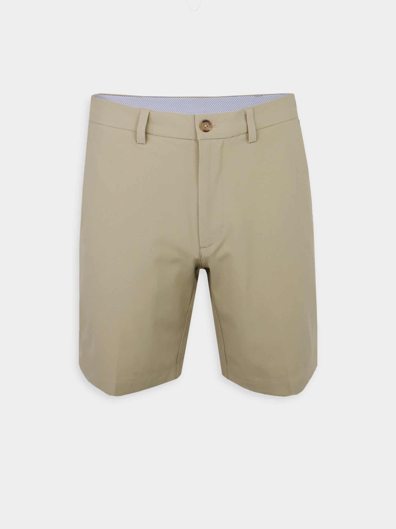 Beige men's performance golf shorts with a single button closure and belt loops, set against a white background. Minimalist, casual, and neatly tailored design.