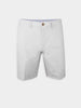 White knee-length men's performance golf shorts with a button closure, belt loops, and a neat, pressed finish