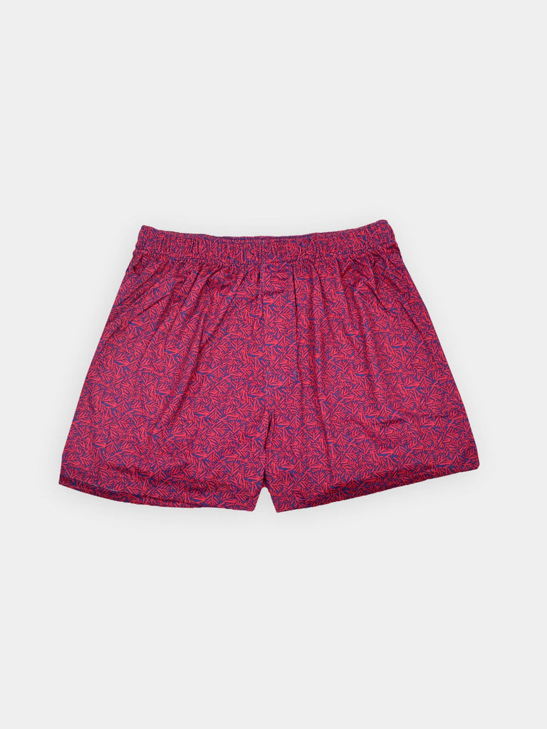 Red and navy blue men's boxer shorts made with moisture wicking fabric