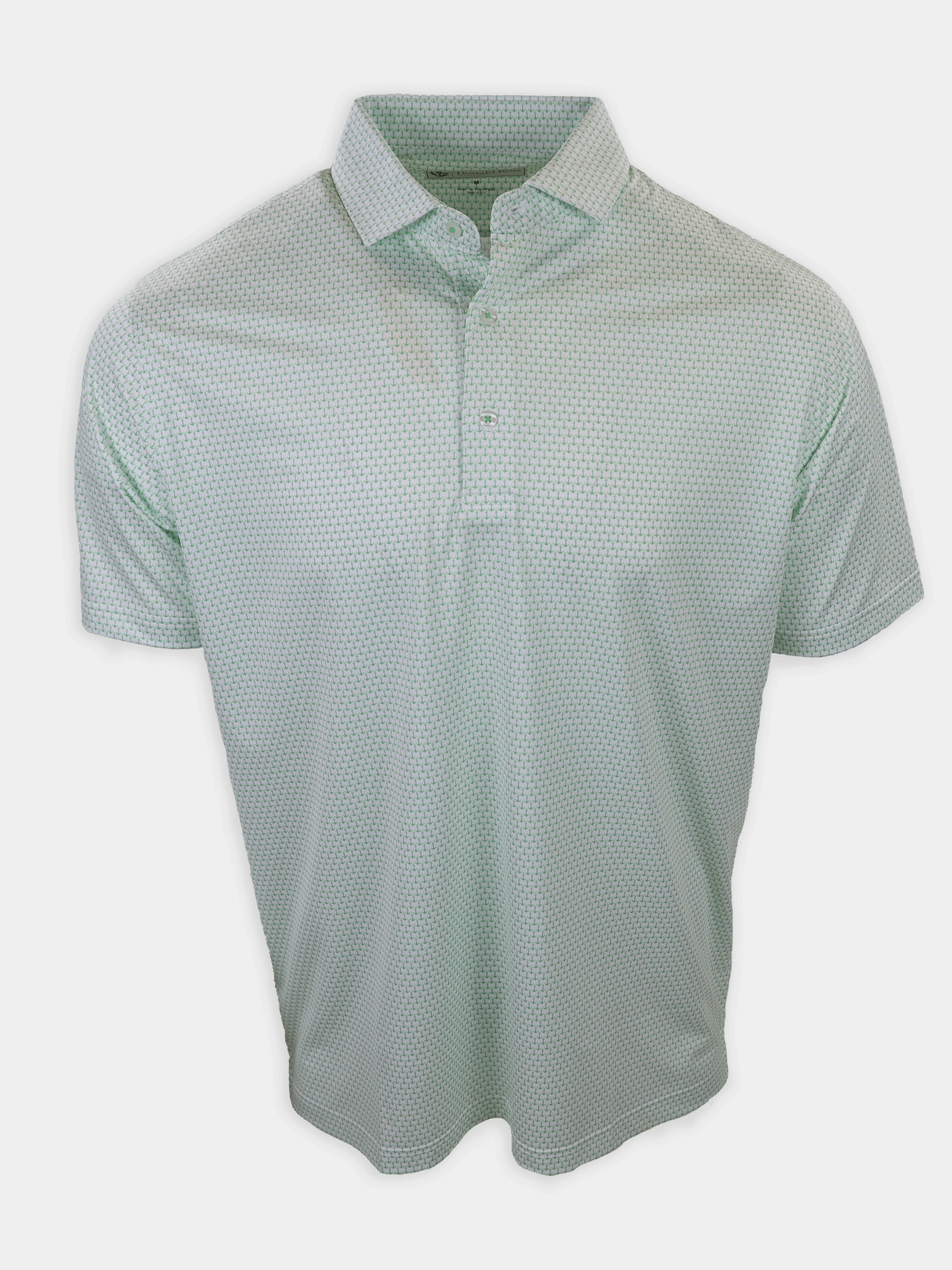 Light green polo shirt with a patterned design displayed on a plain background.