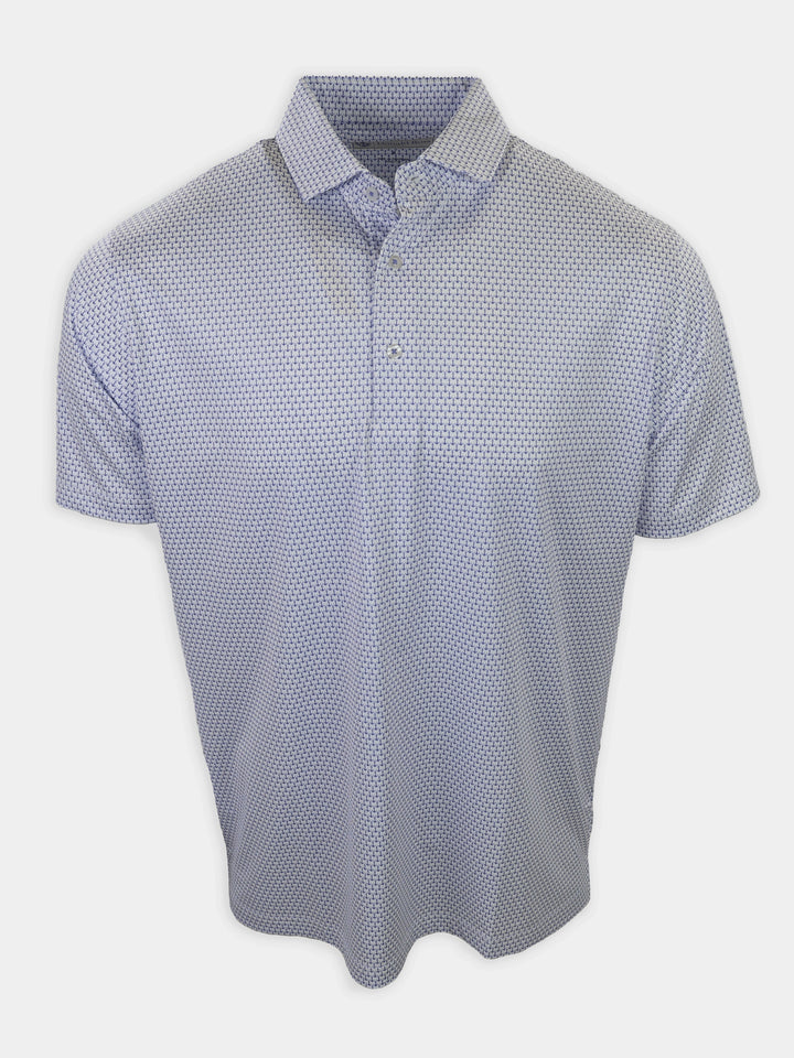 Short-sleeved polo shirt with a light blue and navy patterned design is displayed against a white background.