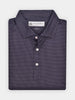 Folded short-sleeve button-up shirt with a black and white geo print pattern. It conveys a polished, modern style with subtle elegance.