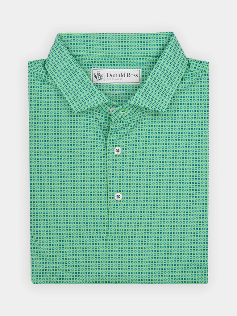 Green button-up shirt with a small geo print pattern, made with performance fabric for golfers