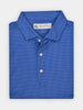Folded blue button-up shirt with a small white ge print pattern against a light background, conveying a neat and professional appearance