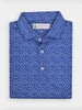 Folded blue polo shirt with intricate white flame pattern. Three white buttons adorn the front