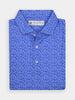 Folded blue golf polo shirt with intricate white flame pattern and three buttons
