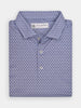 Folded light blue collared shirt with small purple pepper pattern and white buttons, set against a white background