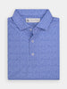 Folded blue textured polo shirt with a pointed collar and three buttons. The fabric features a subtle pattern of small water droplets
