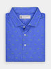 Folded blue polo shirt with small green dogwalker patterns, buttoned collar, and a tag on the inside