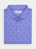 Folded blue polo shirt with small blue golfer and dog pattern, featuring a collar, buttoned placket, and a Donald Ross label