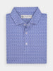 Folded blue golf polo shirt with a toucan pattern, featuring a pointed collar and three white buttons.