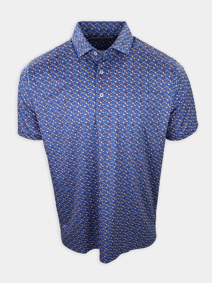 A blue short-sleeve polo shirt with a colorful pattern of small shapes is displayed.