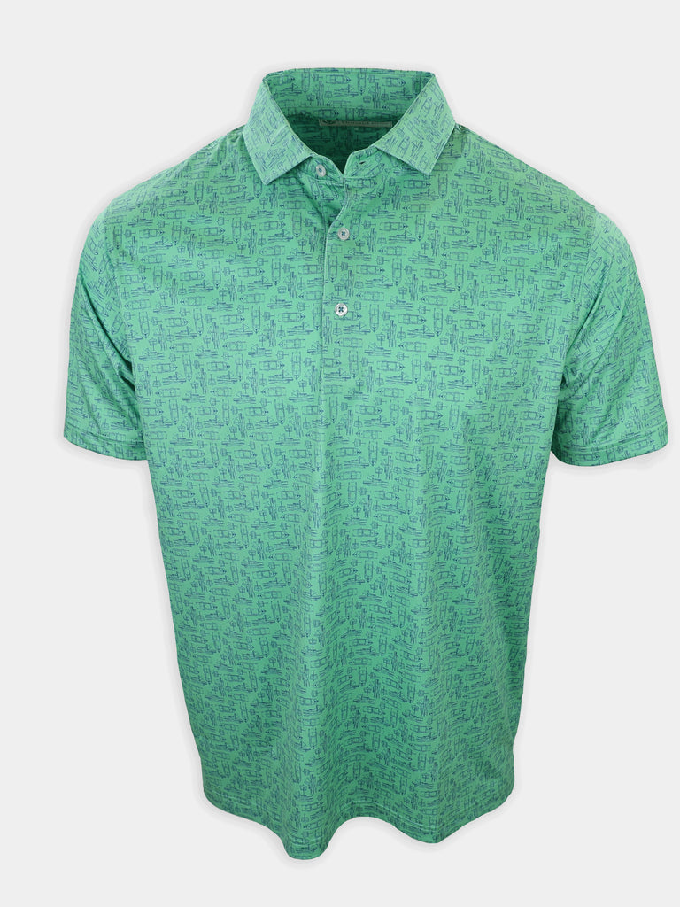 A green polo shirt with a patterned design is displayed against a white background.