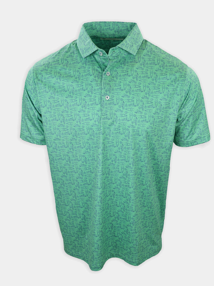 A green polo shirt with a patterned design is displayed against a white background.