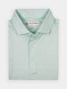 Folded light green golf polo shirt for men with subtle white vine pattern, neatly collared