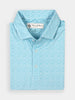 Light blue polo shirt with an intricate white vine attern, neatly folded. Features a collar, buttons, and a label on the inside. Crisp, elegant design.