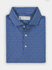Blue patterned shirt neatly folded, featuring a small print of sunglasses in white, blue, pink, and green