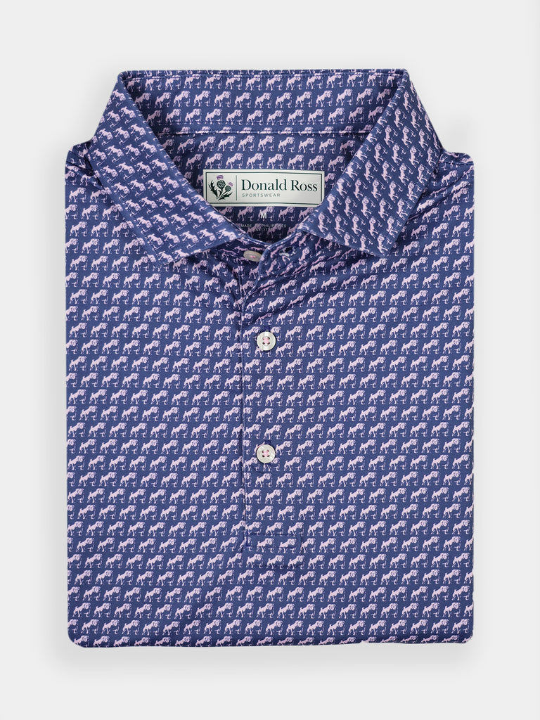 Folded blue polo shirt with a playful bulldog print pattern and a collar