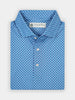 Light blue polo shirt with small navy palm tree pattern, featuring a folded collar and white buttons