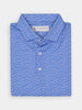 Folded blue collared shirt with white flower patterns. The design is vibrant and playful, evoking a cheerful and casual tone.
