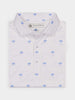 White polo shirt with a subtle blue Donald Ross logo pattern, neatly folded. The collar is crisp, and the shirt conveys a polished, classic style.